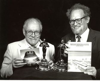 Dr. Gordon Danby (left) and Dr. James Powell (right)